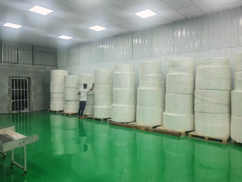 Paper napkin raw material rolls in Artcool Cambodia paper product plant